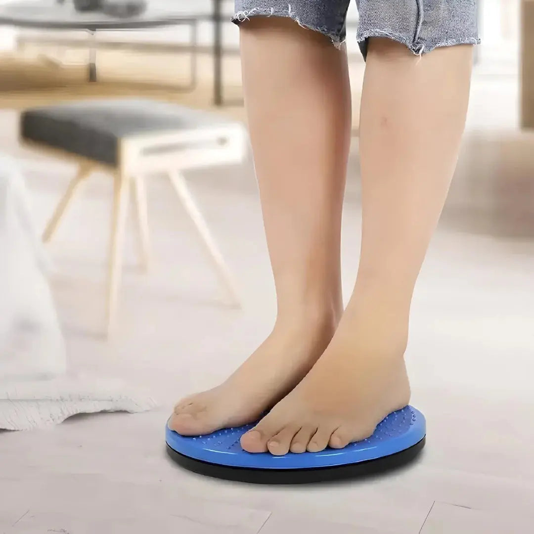 Person using blue tummy twister abdominal exerciser at home, IndianChic fitness gear
